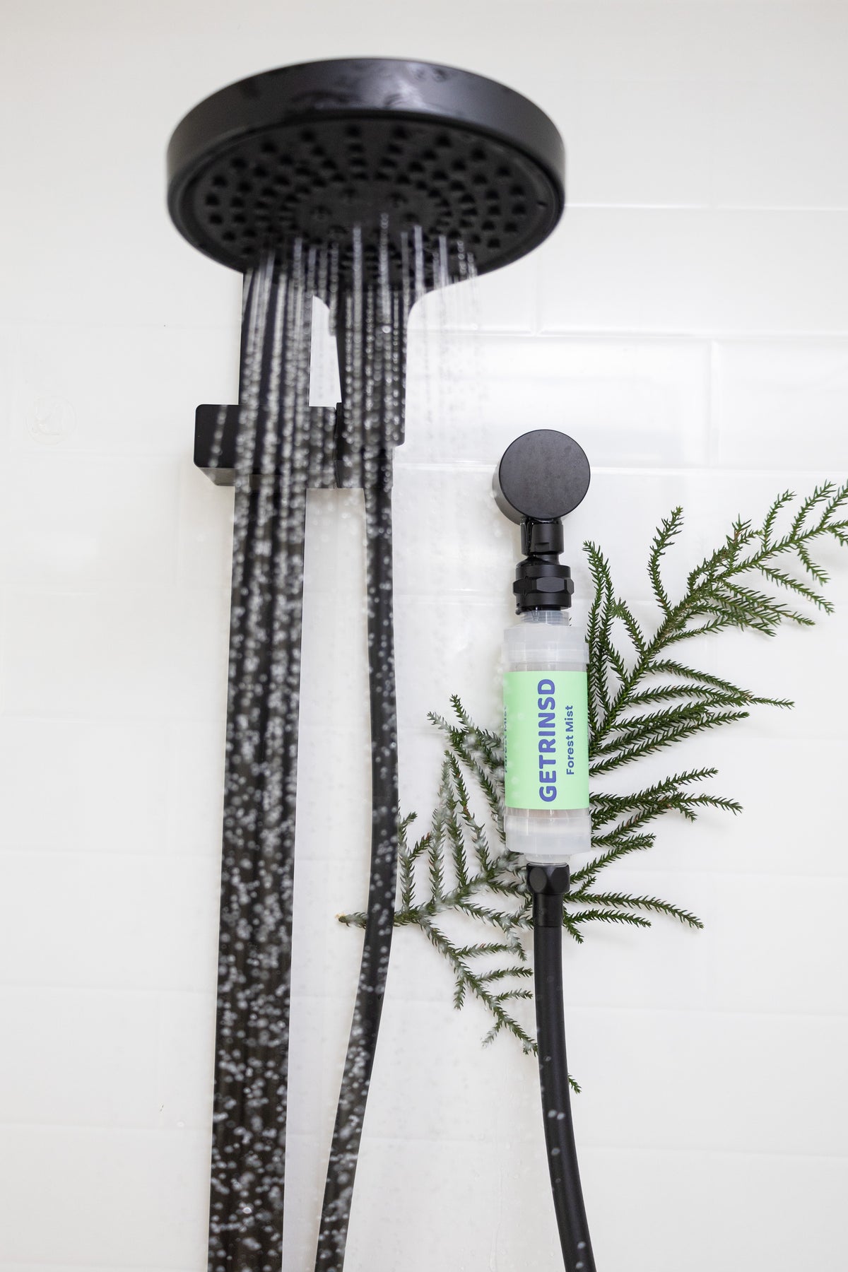GETRINSD Vitamin C Aroma Shower Filter in Forest Mist scent, showing the sleek filter design and packaging.