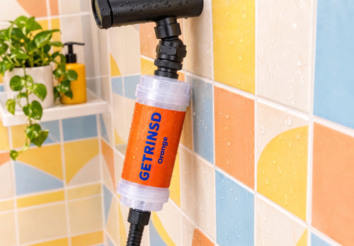 Black GETRINSD swivel adapter with a secure connection, designed for versatile use in electronic or mechanical applications.