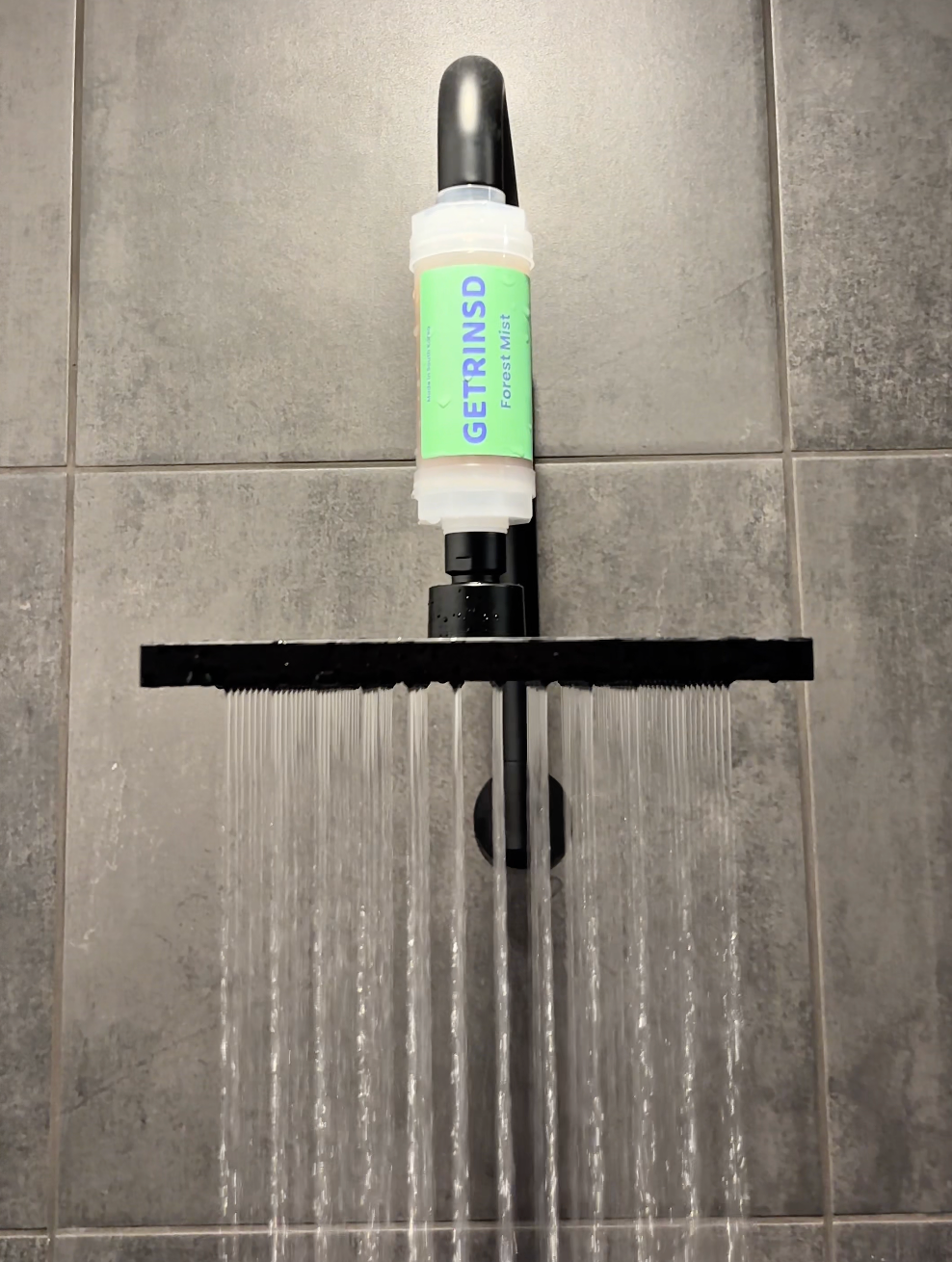 GETRINSD Vitamin C Aroma Shower Filter with lavender scent, showing the filter unit designed to improve shower water quality.